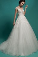 Robe de mariée sexy de traîne moyenne avec nœud textile en tulle ligne a