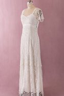 Robe de mariée vintage manche nulle en plein air longueur au ras du sol avec gradins