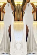 Robe de soirée onirique manche nulle de dos nu de traîne courte naturel