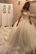 Robe de mariée textile en tulle appliques de traîne longue avec manche longue junoesque