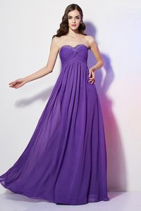 Robe de soirée longue a-ligne fermeutre eclair avec perle manche nulle