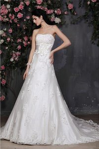 Robe de mariée avec perle de bustier cordon de princesse decoration en fleur