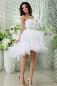 Robe de mariée ceinture textile en tulle avec perle de bustier manche nulle
