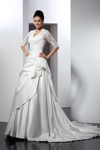 Robe de mariée longue ligne a de tour de ceinture empire en satin de princesse