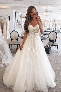 Robe de mariée unique col en forme de cœur de princesse longueur au ras du sol naturel