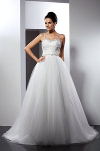 Robe de mariée longue manche nulle textile en tulle avec perle ligne a