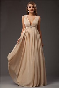 Robe de soirée naturel v encolure avec perle manche nulle avec chiffon