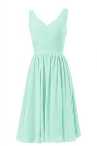 Robe demoiselle d'honneur plissage mode croisade manche nulle v encolure