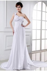 Robe de mariée de princesse avec perle avec fleurs manche nulle fermeutre eclair