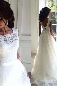 Robe de mariée textile en tulle ceinture en étoffe cordon manche nulle énergique