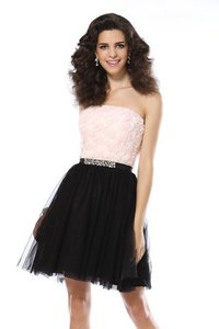 Robe de cocktail bref textile en tulle manche nulle a-ligne fermeutre eclair