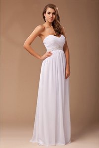 Robe de bal longue avec perle longueur au ras du sol fermeutre eclair collant