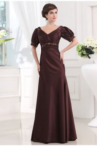 Robe de bal longue manche nulle avec manche 1/2 en satin collant