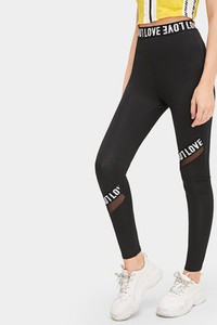 Legging avec pièces glamour transparentes