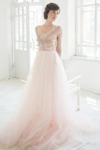 Robe de mariée vintage delicat avec manche longue avec perle de traîne moyenne