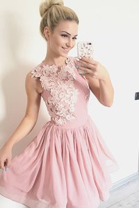 Robe fête de la rentrée encolure ronde glamour manche nulle de princesse appliques