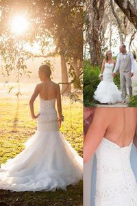 Robe de mariée naturel de traîne moyenne de col en cœur manche nulle en tulle