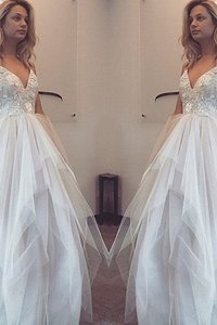 Robe de bal naturel manche nulle textile en tulle bandouliere spaghetti de princesse