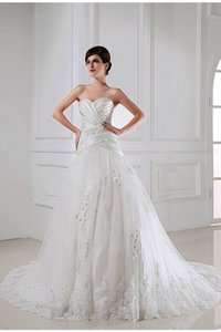 Robe de mariée manche nulle cordon avec perle de princesse textile en tulle