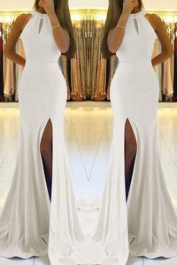 Robe de soirée onirique manche nulle de dos nu de traîne courte naturel