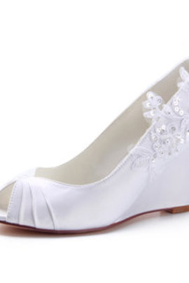 Chaussures pour femme tendance compensées éternel eté romantique