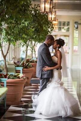 Robe de mariée dos nu en organza longueur au ras du sol avec sans manches de sirène