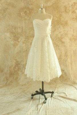 Robe de mariée nature avec fleurs ruché ligne a arrivée au mollet