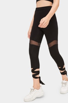 Legging avec pièces transparentes à lacets