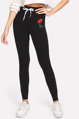 Pantalons moulant et applique de rose avec lacet