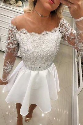 Robe fête de la rentrée angélique avec chiffon a-ligne naturel bref