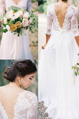 Robe de mariée avant-gardiste manche nulle appliques ligne a longueru au niveau de sol