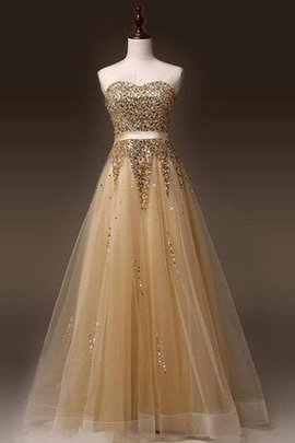 Robe de soirée brillant manche nulle ligne a fermeutre eclair textile en tulle