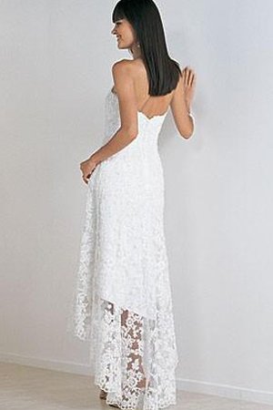 Robe de mariée impressioé de bustier avec chiffon a plage haut bas - photo 2