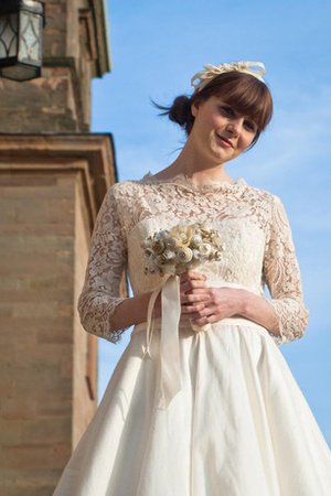 Robe de mariée avec manche 3/4 jusqu'au mollet lache en 1/2 manche ligne a - photo 2